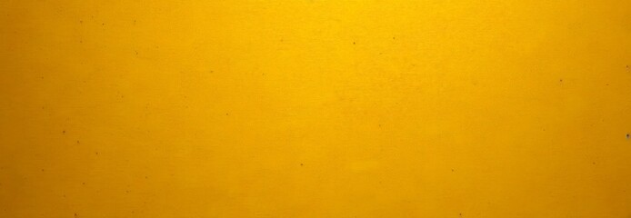 Leinwandbilder - a close-up view yellow wall with small, irregularly shaped specks or specks of dirt or dust scattered across it