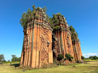 3 ancient towers built of bricks that have aged over time