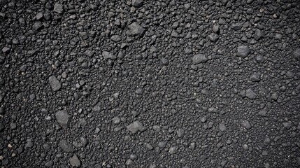 textured asphalt ground, black gravel surface, high detail, rugged terrain, realistic texture, detailed close-up, dark pavement, gritty surface, road material