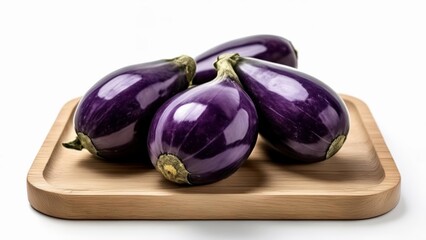 Wall Mural -  Fresh purple eggplants on a wooden tray