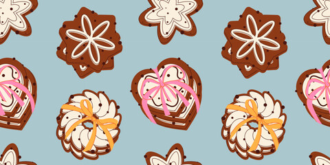 Seamless gingerbread pattern. Chocolate gingerbread cookies with decorations and milk cream. Gingerbread cookies with bows on a blue background. Pastries, cream, sweets, chocolate, decorations. Sweet 