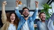 © Pinklife - Three colleagues cheer enthusiastically with raised arms, celebrating success or a milestone achieved in a bright, modern office environment showcasing collaboration.
