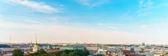 Wall Mural - Panoramic view of the city and the beautiful roofs of the city on a sunny day from The colonnade of St. Isaac's Cathedral.. Saint Petersburg, Russia - 26 June 2024