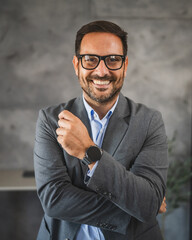 Portrait of confident businessman smile in modern office