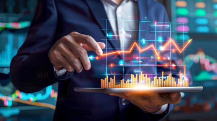 Wall Mural - businessman looking at virtual stock chart on tablet