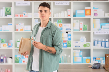 Poster - Male customer with his order at pharmacy