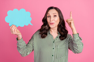 Canvas Print - Photo of nice aged woman point finger empty space bubble wear striped shirt isolated on pink color background