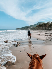 Horseback riding on the beach