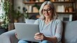 © WS Studio 1985 - Happy Woman Using Laptop in Cozy Living Room