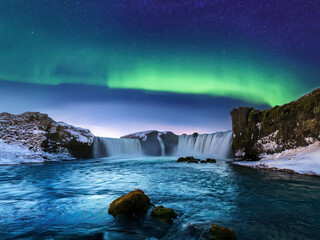 aurora at night with waterfall