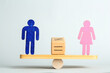 © New Africa - Gender equality concept. Male and female figures on scales against light background