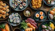 © Gentle Bunny - An assorted platter of delicious sushi, sashimi, and Japanese appetizers beautifully arranged on dark plates.