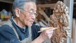 © chic designs - 日本の職人が春のお祝いのために精巧な木製の神社の装飾を彫っている