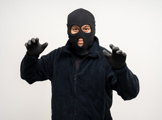 Wall Mural - Thief in uniform black jacket various pose on isolated background. The Robber terrorism criminal escapes with balaclava and crowbar entering a house for stealing Housebreak