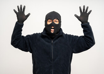 Wall Mural - Thief in uniform black jacket various pose on isolated background. The Robber terrorism criminal escapes with balaclava and crowbar entering a house for stealing Housebreak