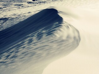 A serene abstract representation of a sand dune's curve, showcasing gentle waves and soft, smooth textures against a subtle backdrop.