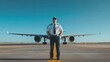 © AriyaniAI - Pilot Standing in Front of an Airplane on the Runway