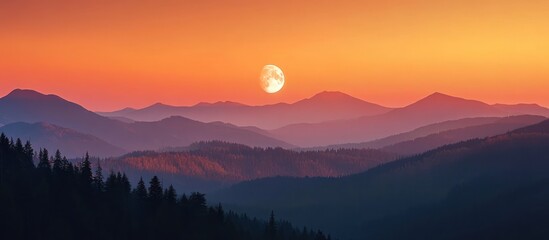 Wall Mural - A scenic view of a mountain range with a full moon in the sky. The mountains are layered and the sky is a beautiful orange and pink color.