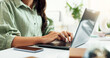 © HockleyM3/peopleimages.com - Hands, typing and woman in home office with laptop, research or networking for freelance project. Remote work, connectivity and girl at desk writing email, report or online review for business plan