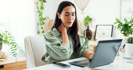 Wall Mural - Shoulder pain, woman and online with laptop, serious and burnout for project, tension and hurt in office. Digital, copywriting and person with injury, poor posture and stress of workload and ache