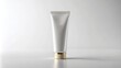 © night - Minimalist White Cosmetic Tube on Neutral Background with Gold Cap