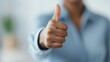 © Jayda_ArtistryHub - Person giving a thumbs-up after completing a successful job interview, feeling confident about their chances   successful interview, job confidence