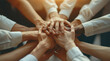 © visoot - Close-up of business people's hands together in teamwork, support, and unity concept. A group or company that works as one to achieve success.