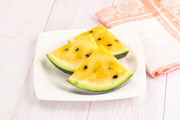 Wall Mural - Sweet and juicy yellow watermelon slices