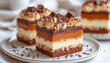 © ЮРИЙ ПОЗДНИКОВ - Delicious caramel cake being served on white plates