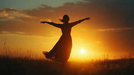 Wall Mural - Silhouette of a Woman with Outstretched Arms at Sunset in a Field, Embracing Freedom and Nature