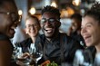 © Yuliia - Beautiful male and female restaurant staff wearing eyeglasses, smiling and laughing, diverse group of African and Caucasian employees in uniform.