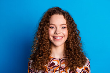 Poster - Photo portrait of attractive young woman look camera toothy smile dressed stylish colorful clothes isolated on blue color background