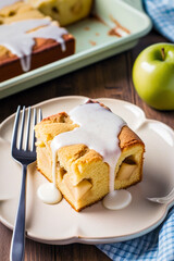 Poster - A square piece of apple pie with a moist texture and large pieces of apples on a plate