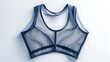 © Elnare - A blue mesh sports bra isolated on a white background.