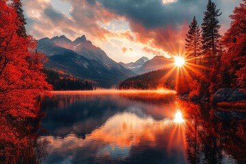 Wall Mural - a serene sunset over a tranquil lake surrounded by autumn foliage and majestic mountains.