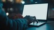 © Imsuniyah - Person Typing on a Laptop at Night