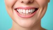 © Chanwit - A close-up of a mockup tooth and dental tools on a trolley