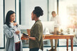 © SunriseDon/peopleimages.com - Business people, teamwork and women with tablet, conversation and planning with advice, network and connection. Employees, coworkers or consulting agency with tech, app or brainstorming for project