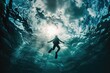 © Ева Поликарпова - Diver swimming beneath the surface of the ocean