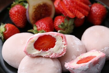 Sticker - Delicious mochi with strawberries and fig on plate, closeup