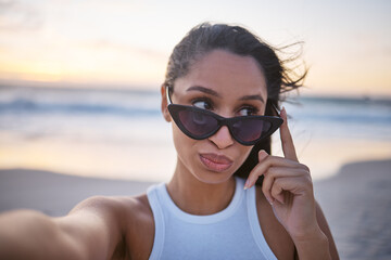 Wall Mural - Beach, woman and sunglasses with selfie on holiday for social media post and profile picture in Mauritius. Female person, smile and portrait on summer vacation for memories, relax and break on breeze