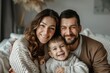 © Ева Поликарпова - A family moment captured on camera - a loving couple holding hands with their young child