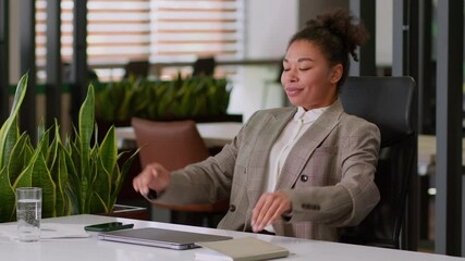 Female businesswoman African American ethnic woman employer business worker finish complete online work at office end close laptop satisfied happy girl put hands behind head relax on chair rest smile