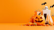 © ZaStock - A lively Halloween-themed banner displays carved pumpkins, cute ghost decorations, and colorful gifts set against a bright orange backdrop, perfect for holiday promotions