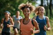 © Ева Поликарпова - A group of women exercising together on a scenic trail