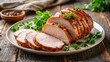 © Udomner - Sliced roasted pork loin with parsley garnish on a plate, pork loin, roasted, sliced, parsley, garnish, meat, dish