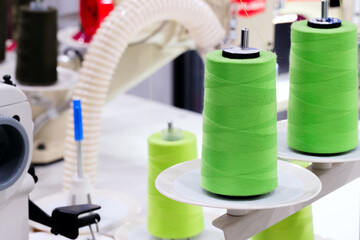 Poster - industrial sewing embroidery machine in fashion factory