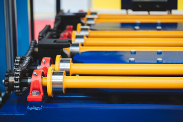 Poster - Industrial roller conveyor with chain transmission, industrial concept background