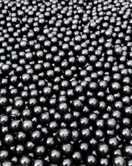 Wall Mural - Abstract background of black spheres.