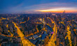 Aerial view of modern city skyline and buildings at sunrise in Shanghai